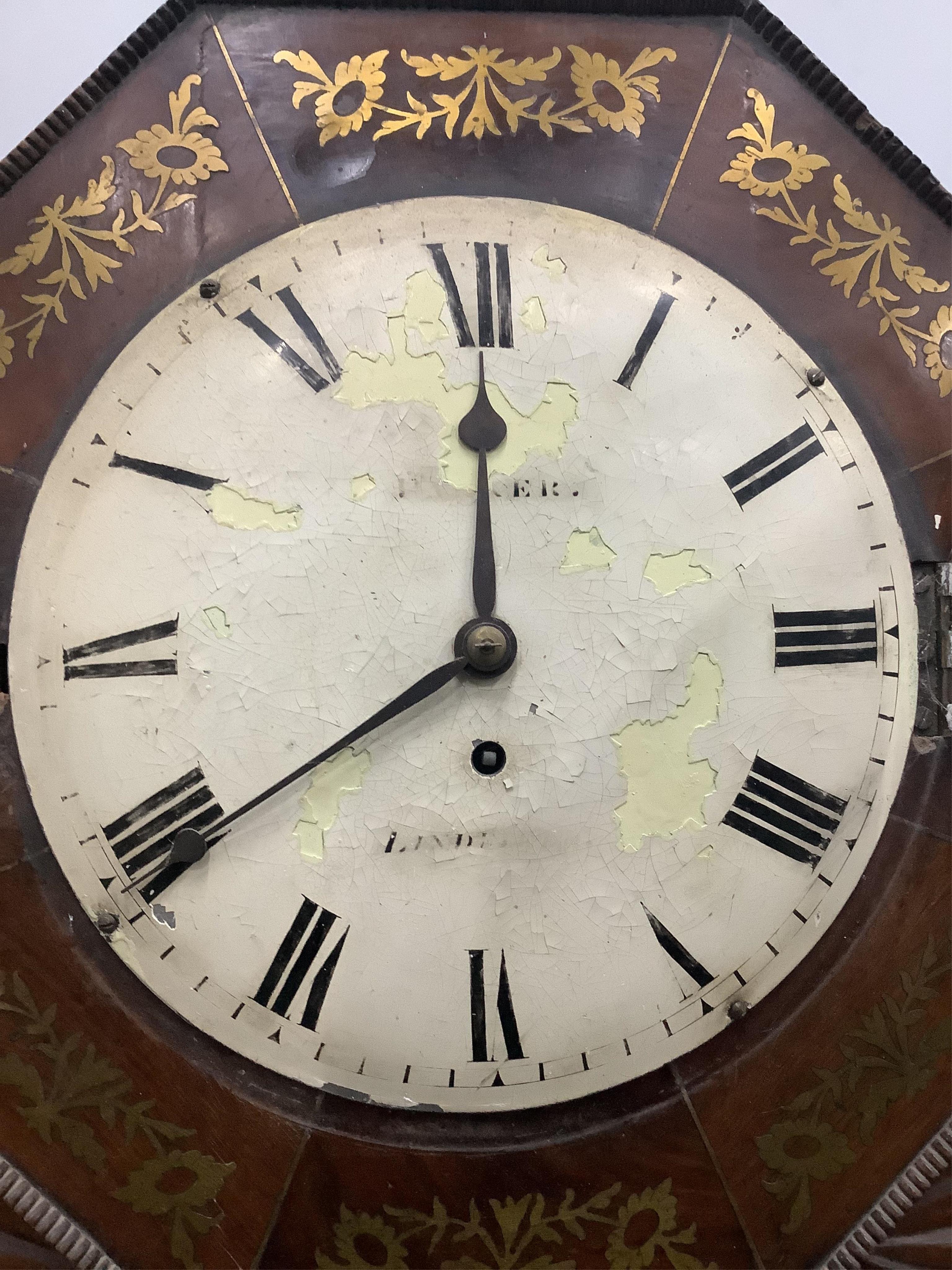 A late Regency cut brass inlaid mahogany single fusee drop dial wall timepiece, height 62cm. Condition - fair, some loose brass work, dial enamel cracking and illegible, pendulum present.